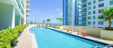 2 outdoor pools, pool umbrellas, pool loungers