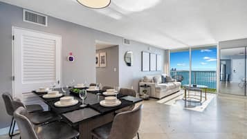 Design Condo, 3 Bedrooms, Balcony, Sea View | Living area | 50-inch plasma TV with cable channels