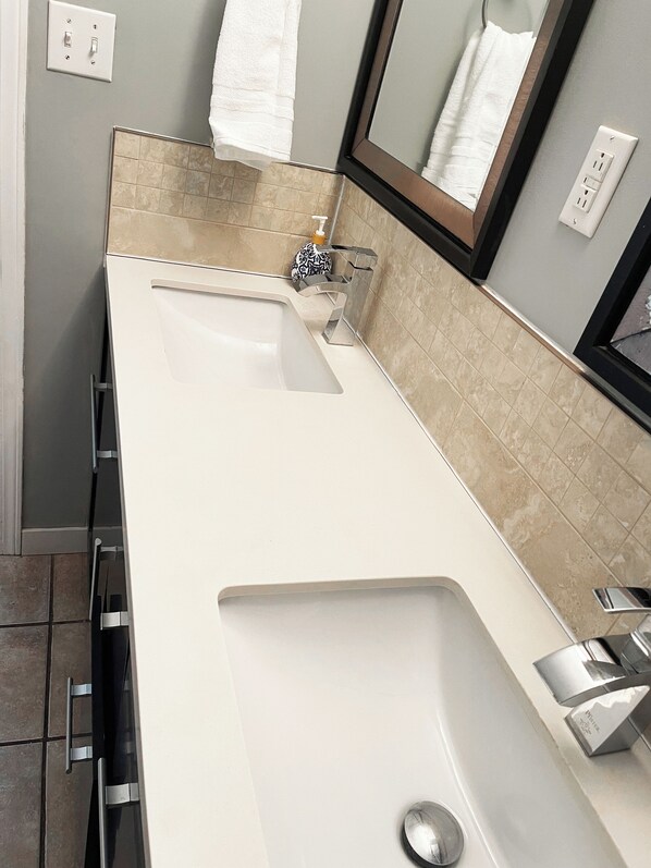 Hair dryer, towels, soap, toilet paper