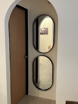Enter a beautifully appointed space through this elegant doorway.