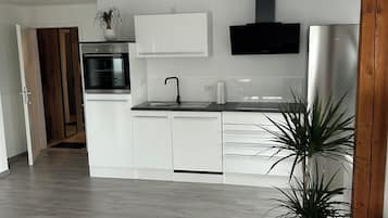 Réfrigérateur, four, plaque de cuisson, lave-vaisselle