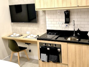 Apartamento superior | Cozinha privada | Micro-ondas, fogão, cooktop, chaleira elétrica