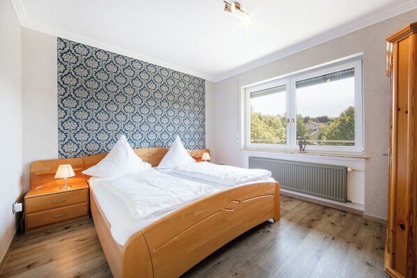 2 bedrooms, desk, iron/ironing board, travel cot