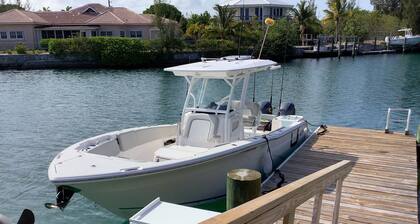 Cozy private green studio cottage on water free floating dock at your doorstep