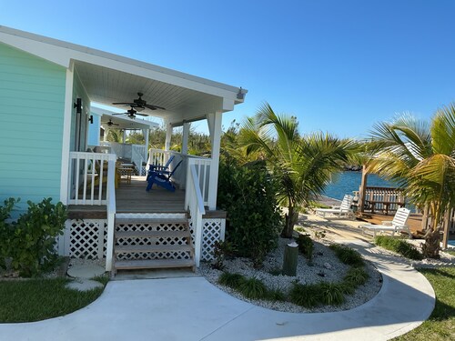 Cozy private green studio cottage on water free floating dock at your doorstep