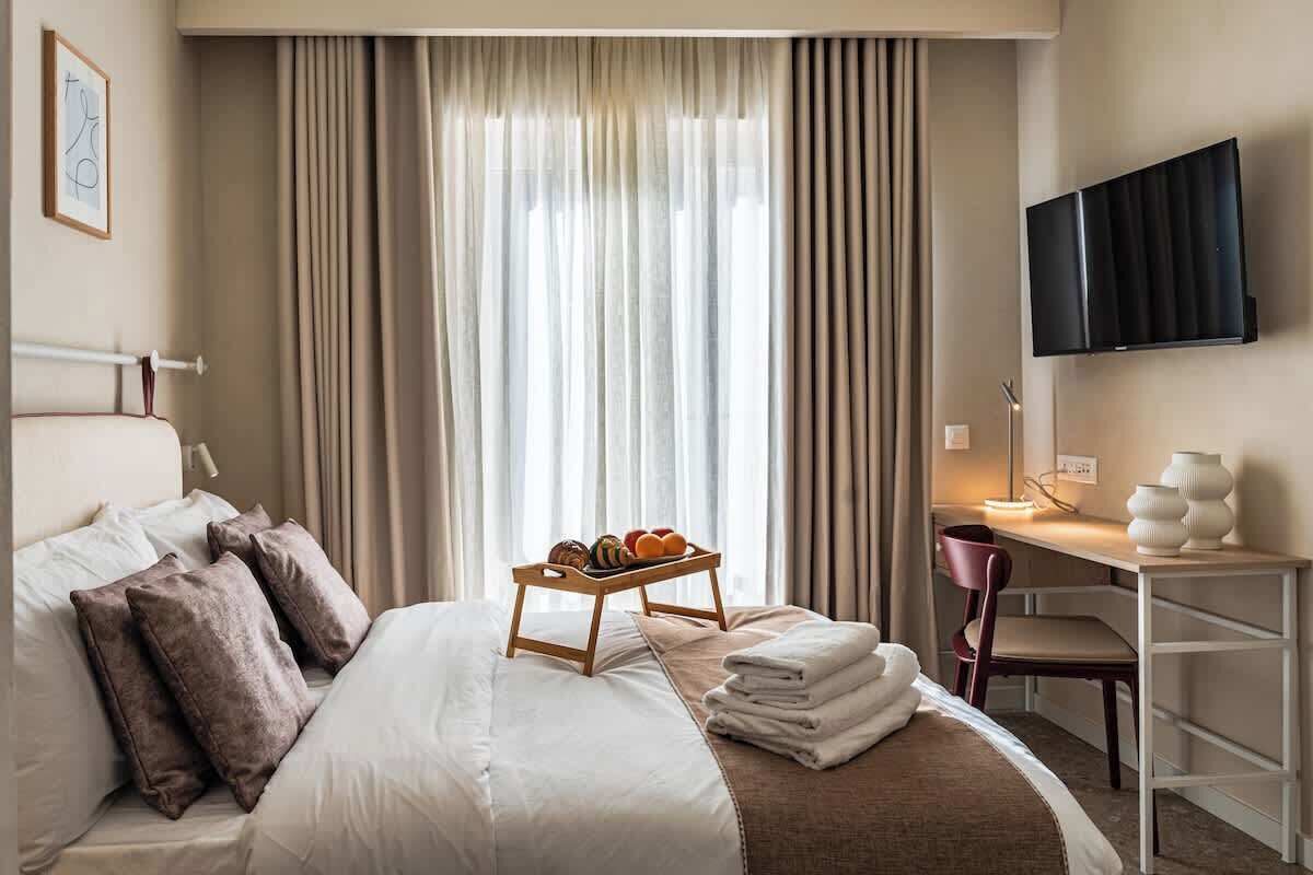 1 habitación, tabla de planchar con plancha, wifi y ropa de cama 