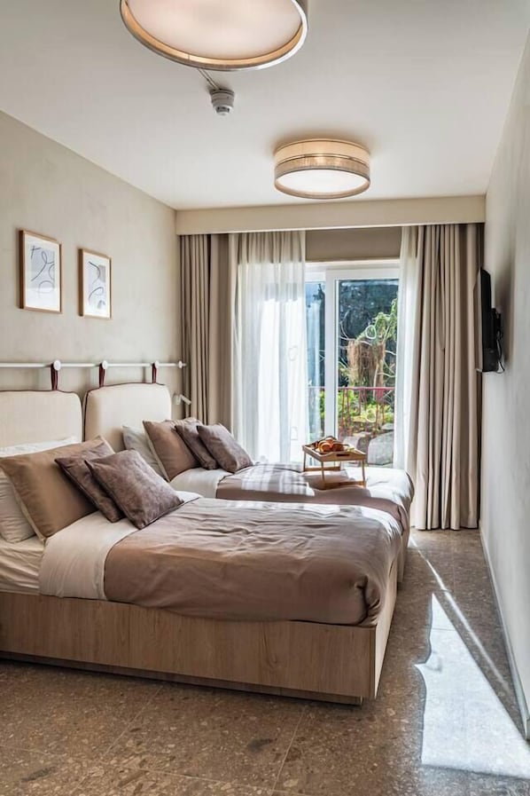 2 bedrooms, in-room safe, iron/ironing board, WiFi