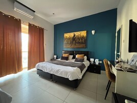 Panoramic Triple Room, Balcony | Minibar, desk, blackout drapes, free cribs/infant beds