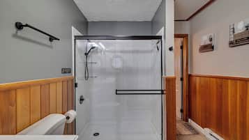 Shower, towels, soap, toilet paper