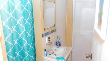 Shower, towels, soap, toilet paper