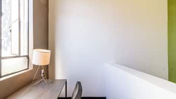 Departamento Deluxe, patio | 1 habitación, cortinas blackout y tabla de planchar con plancha