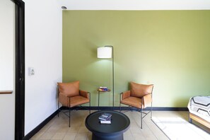 Deluxe Apartment, Patio | Living area