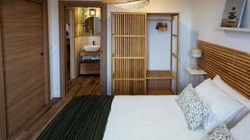 1 dormitorio, caja fuerte, tabla de planchar con plancha y cuna de viaje