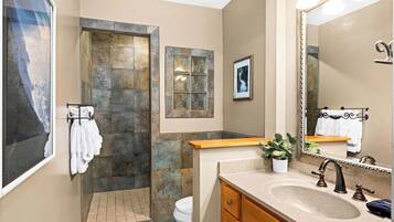 Jetted bath, hair dryer, towels, soap