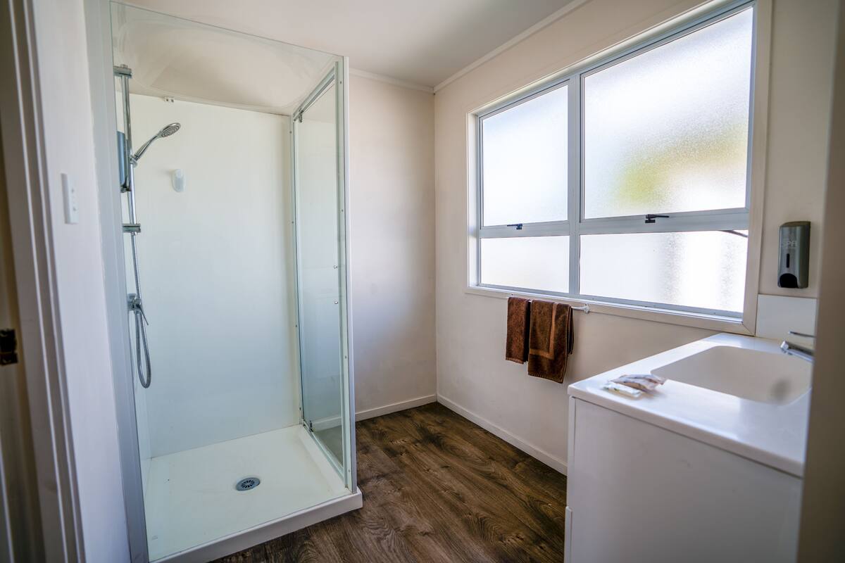 Family Room | Bathroom | Shower, hair dryer, towels, soap