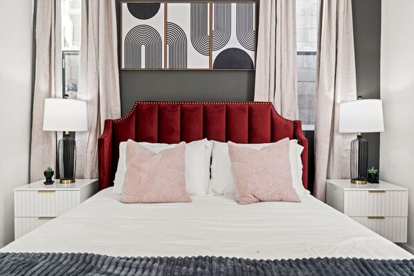 1 bedroom, desk, iron/ironing board, travel crib