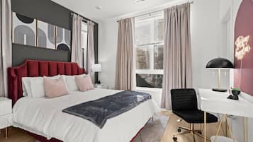 1 bedroom, desk, iron/ironing board, travel crib