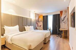 Ropa de cama de alta calidad y minibar 
