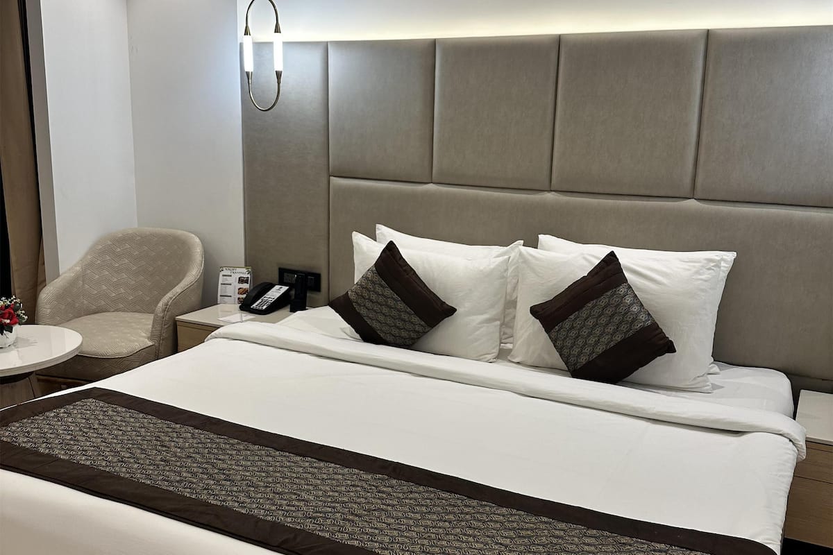 Quarto executivo, 1 cama King, para não fumantes, sacada | Frigobar, cofres nos quartos, cortinas blackout, quartos à prova de som