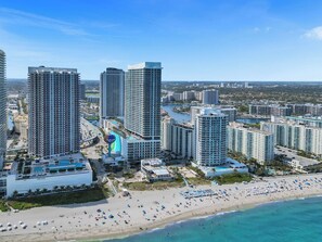On the beach, sun loungers, beach towels