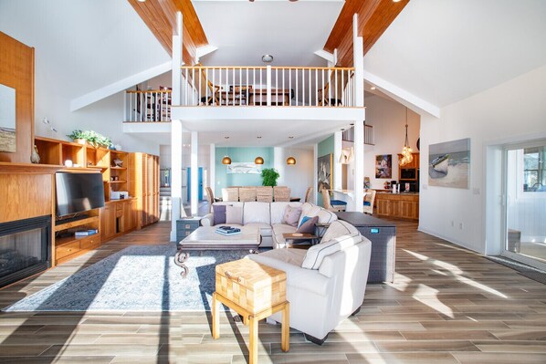Smart TV, fireplace, books, printers