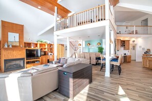Smart TV, fireplace, books, printers