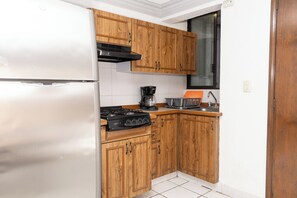 Loft standard | Cozinha americana privada | Micro-ondas, cooktop