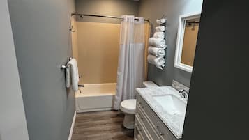 Hair dryer, towels, soap, shampoo