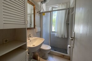 Regadera y secadora de cabello 