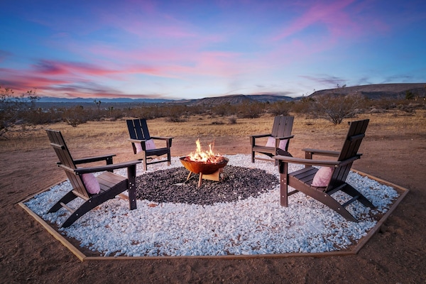 Gather for s’mores and stargazing around the cozy fire pit.