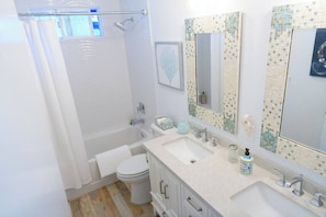 Hair dryer, towels, soap, shampoo
