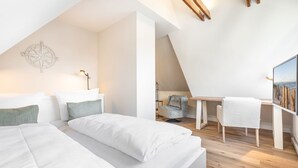 2 عدّة غرف نوم ومكواة/لوح كي وواي فاي وملاءات أسرّة
