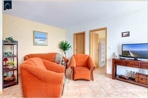 TV - Apartment Strandblick 1 - Cozy apartment with balcony near the beach (Ückeritz)