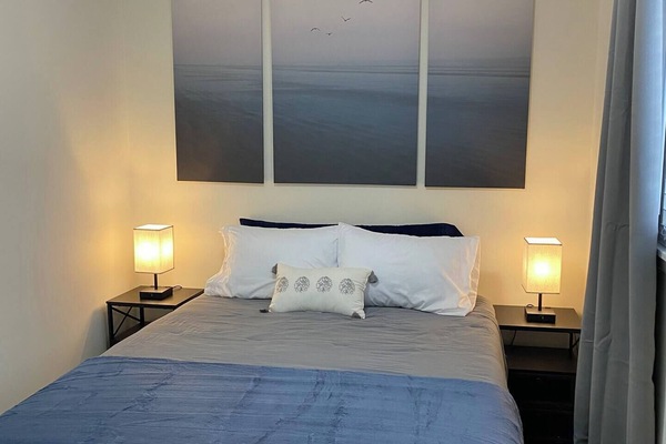 Another one of our bedrooms. In addition to cozy bedding, each bedroom has storage for your belongings.
