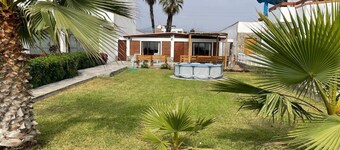 Spacious 4-bedroom house in Playa Bujama with WiFi. Private Beach close to Asia.