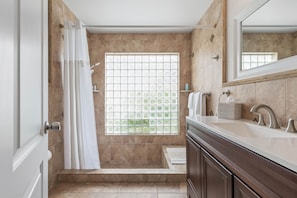 Shower, hair dryer, towels, soap