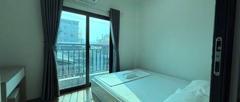 Deluxe Apartment, Balcony, City View | Terrace/patio