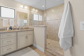 Shower, hair dryer, towels