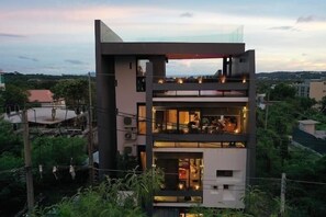 A modern multi-story building with balconies and large windows. - Beautiful Sea View Full Smart House 3BR (Rawai)