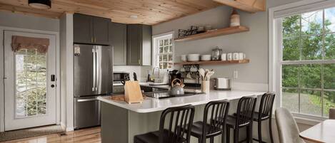 Coffee/tea maker, fridge, microwave, oven