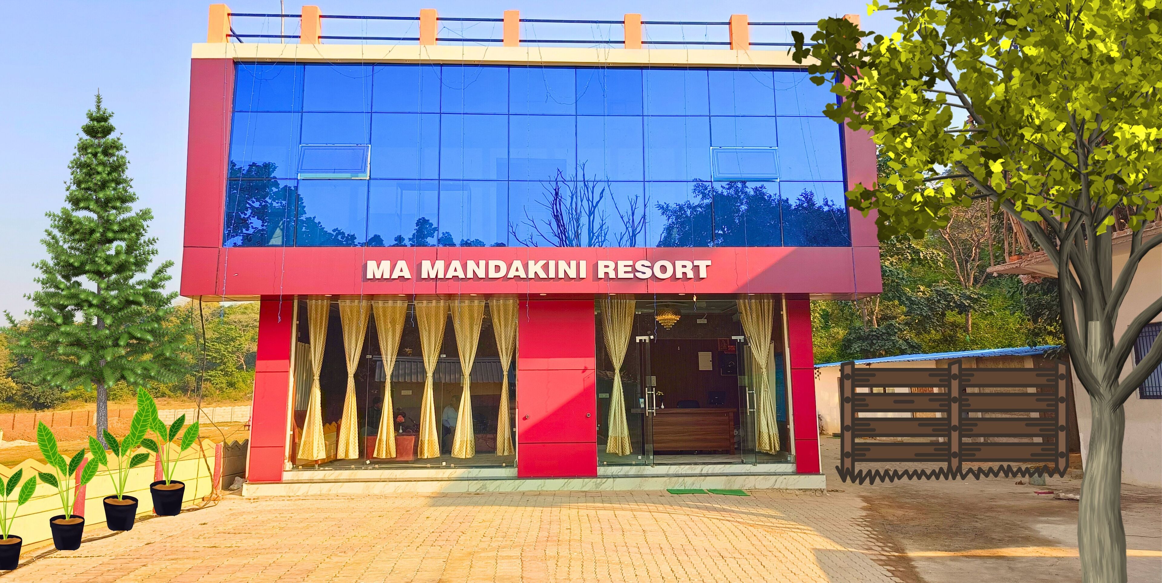 A building with the sign "MA MANDAKINI RESORT" indicating a hotel.