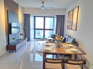 Deluxe Apartment, 3 Bedrooms, City View | Living area