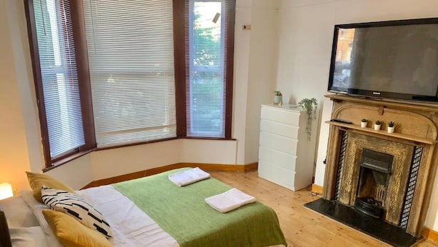 Quarto conforto, 1 cama de casal | Área de estar