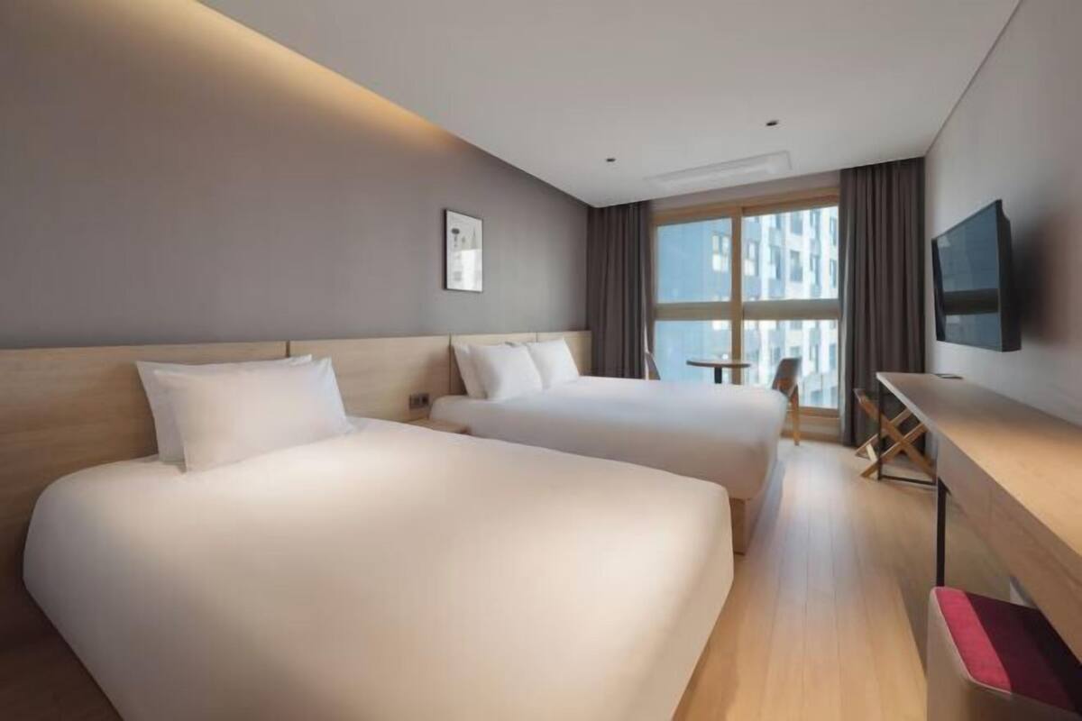 Blackout drapes, soundproofing, WiFi (free), bed sheets