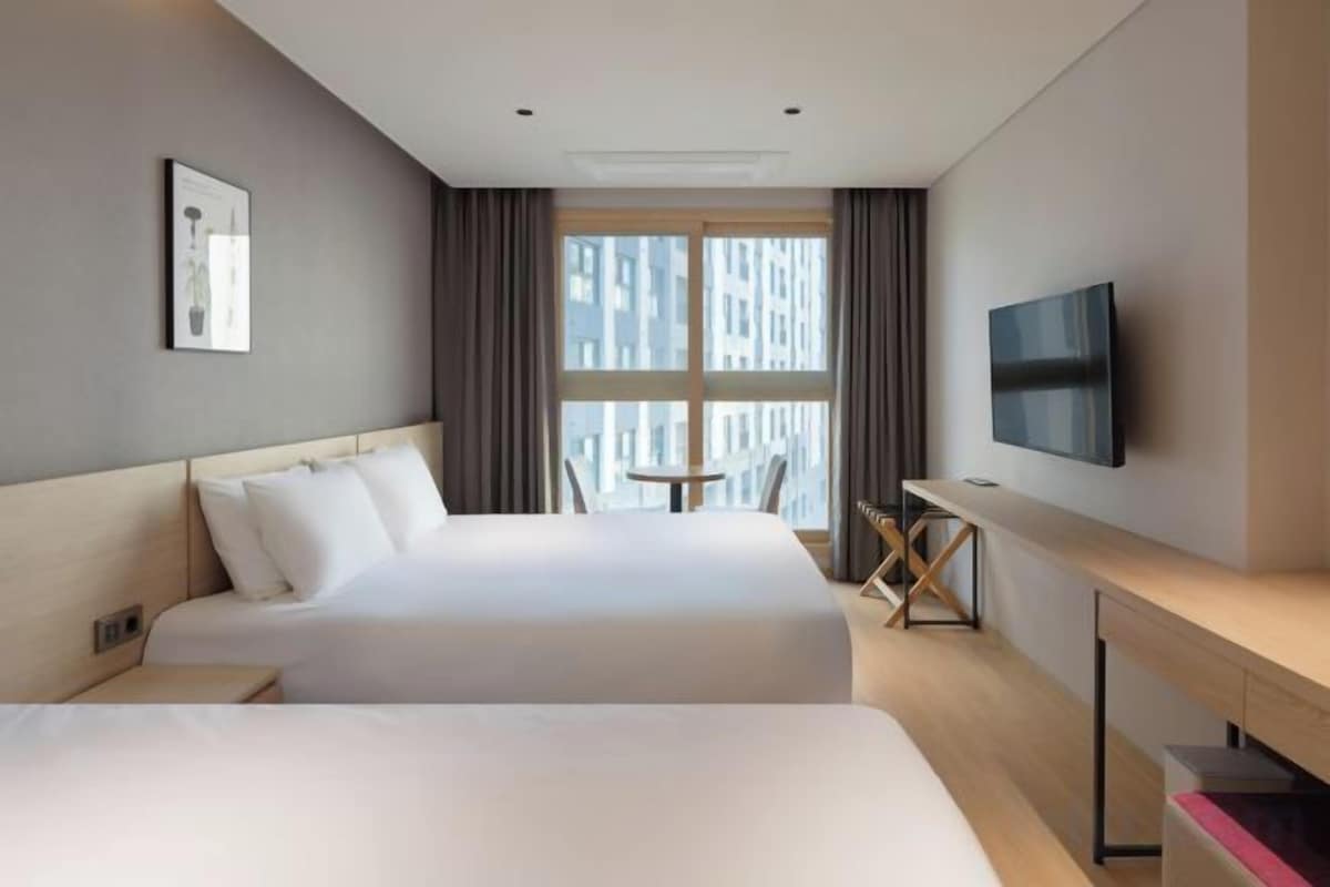 Blackout drapes, soundproofing, WiFi (free), bed sheets