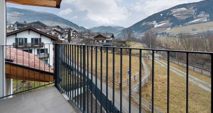 Appartement "Talferblick" avec vue sur les montagnes, terrasse privée et Wi-Fi