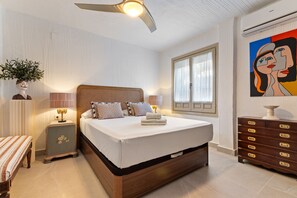 2 habitaciones, tabla de planchar con plancha y cuna de viaje 