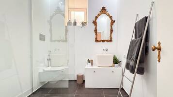 Shower, jetted tub, hair dryer, bidet