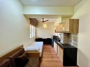 Superior Room | Living area | 32-inch Smart TV with cable channels - Lykke Suites - 2-Min Drive to Colva Beach - By Goan Felicidade Hospitality Pvt. Ltd. (Colva)