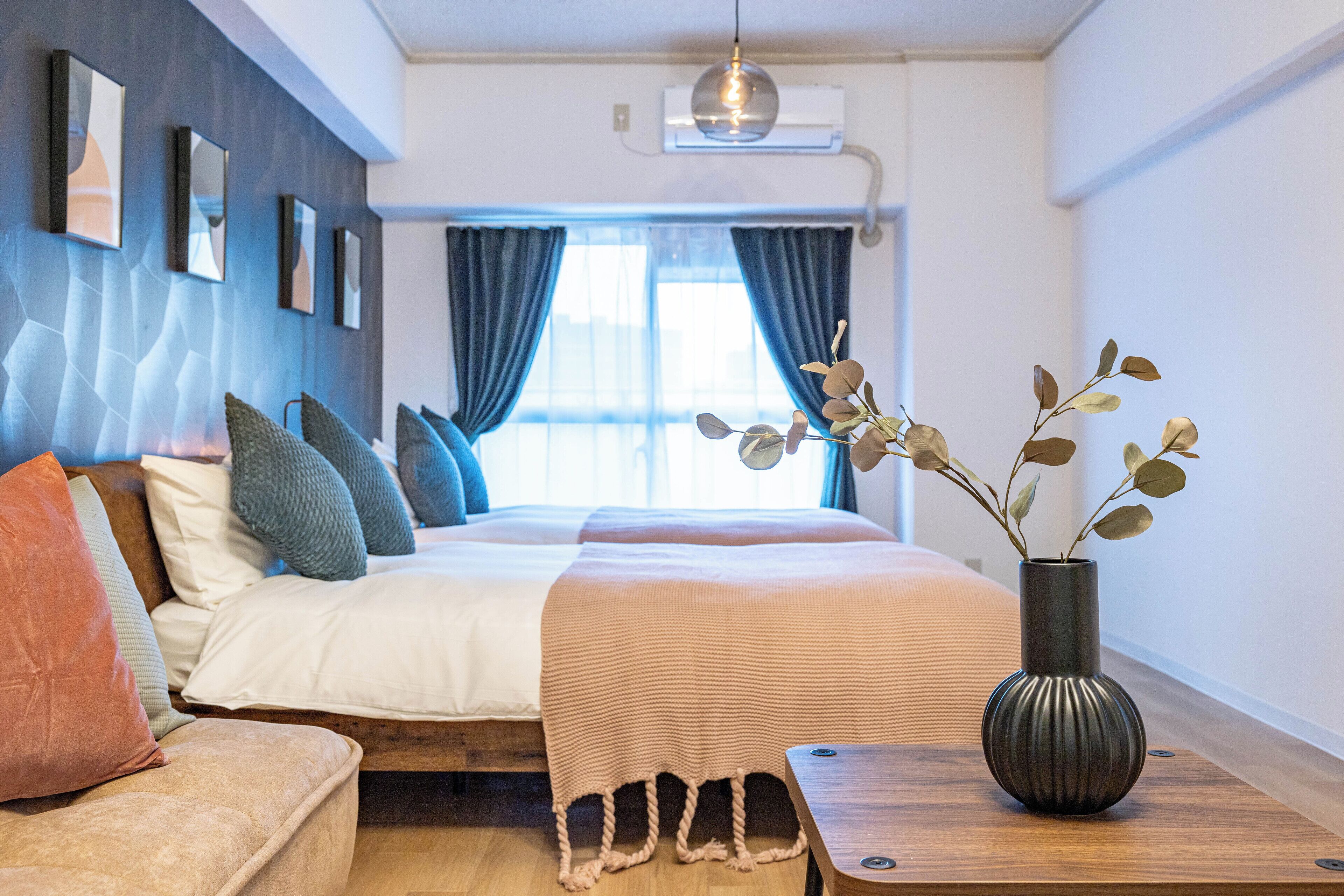 Deluxe Apartment, Balcony, City View | Living area | 50-inch flat-screen TV with cable channels